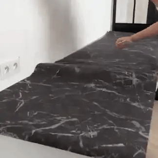 Instalación real del vinilo de mármol